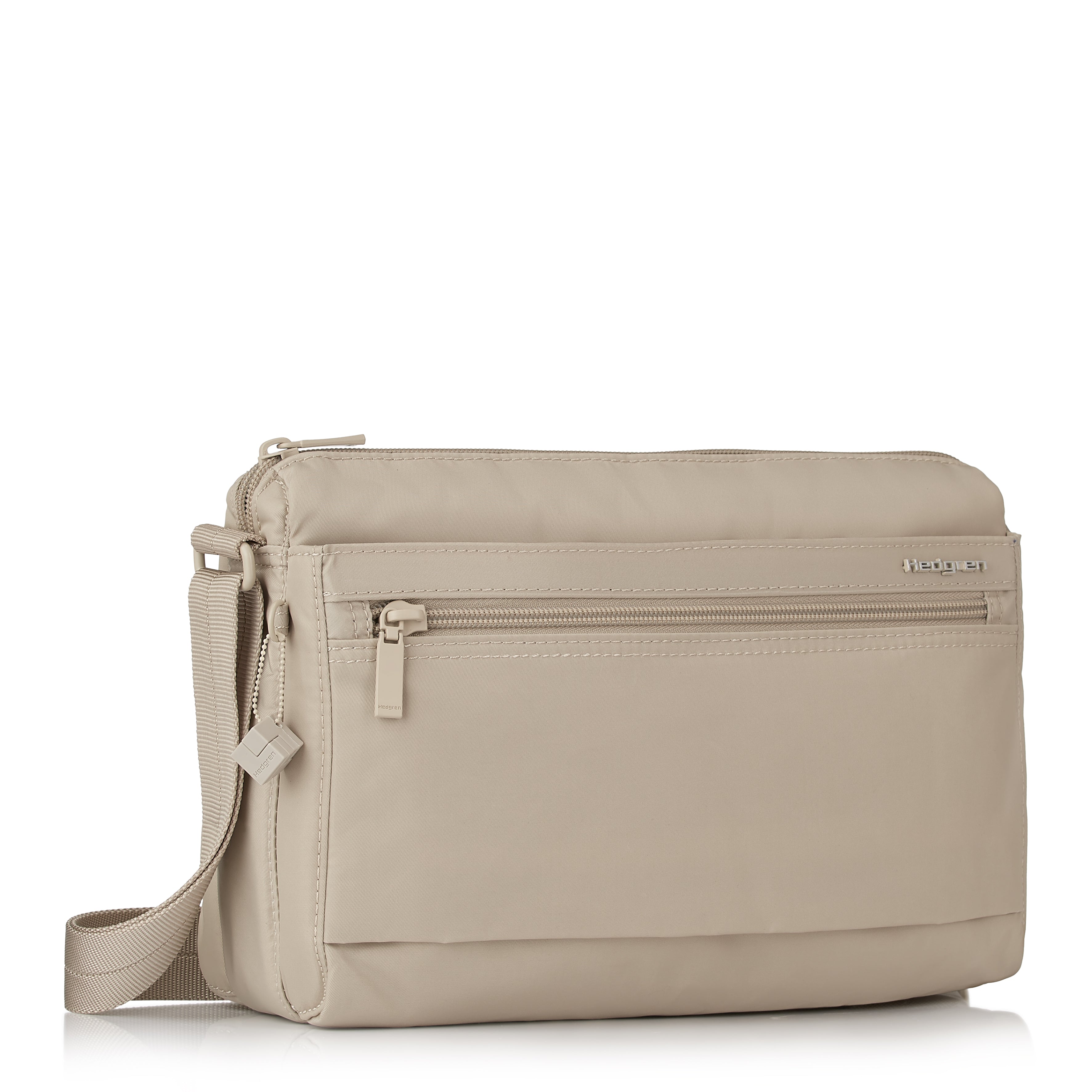 Front angled view of Hedgren EYE MEDIUM Crossbody in Cashmere Beige