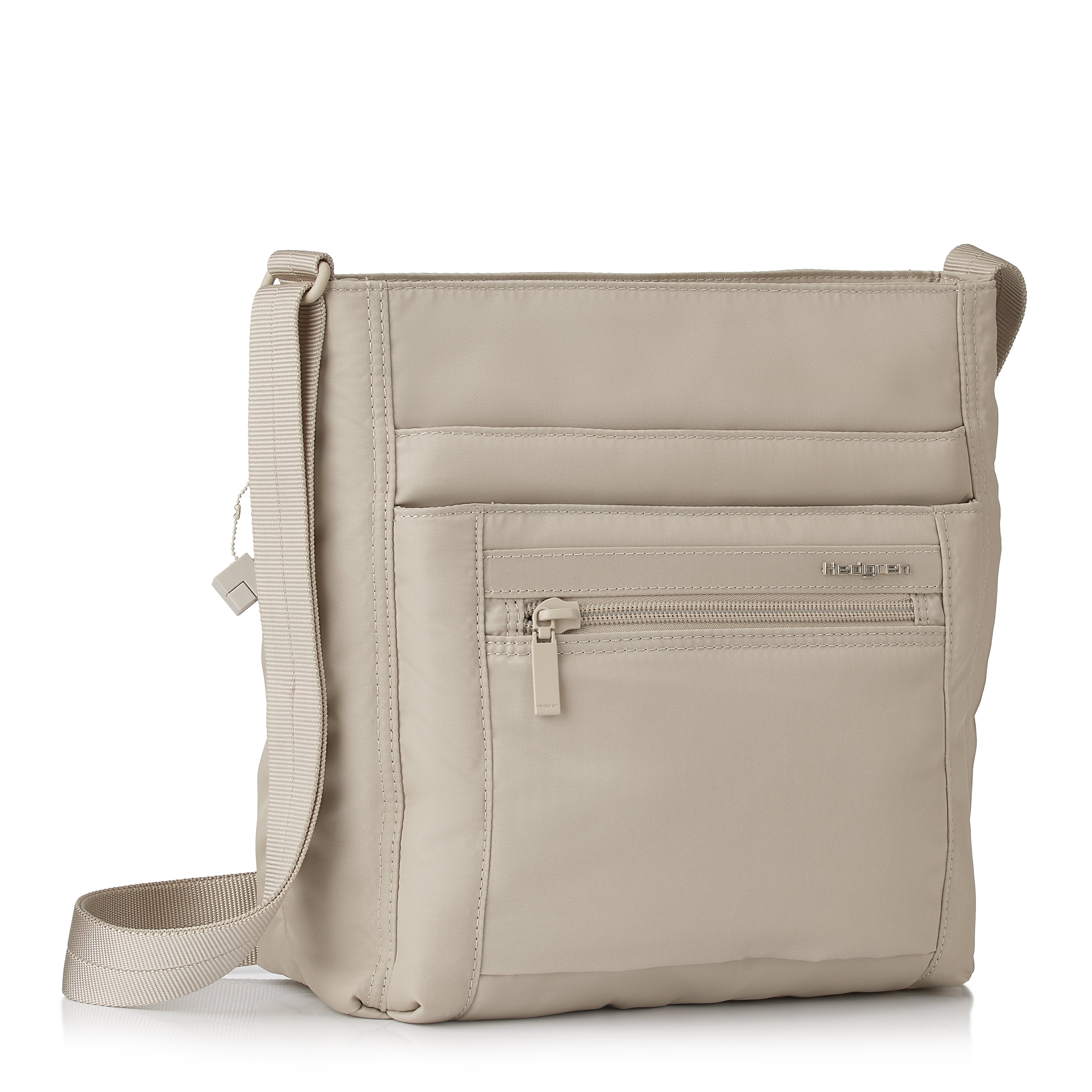 Front angled view of Orva RFID Crossbody #color_cashmere beige