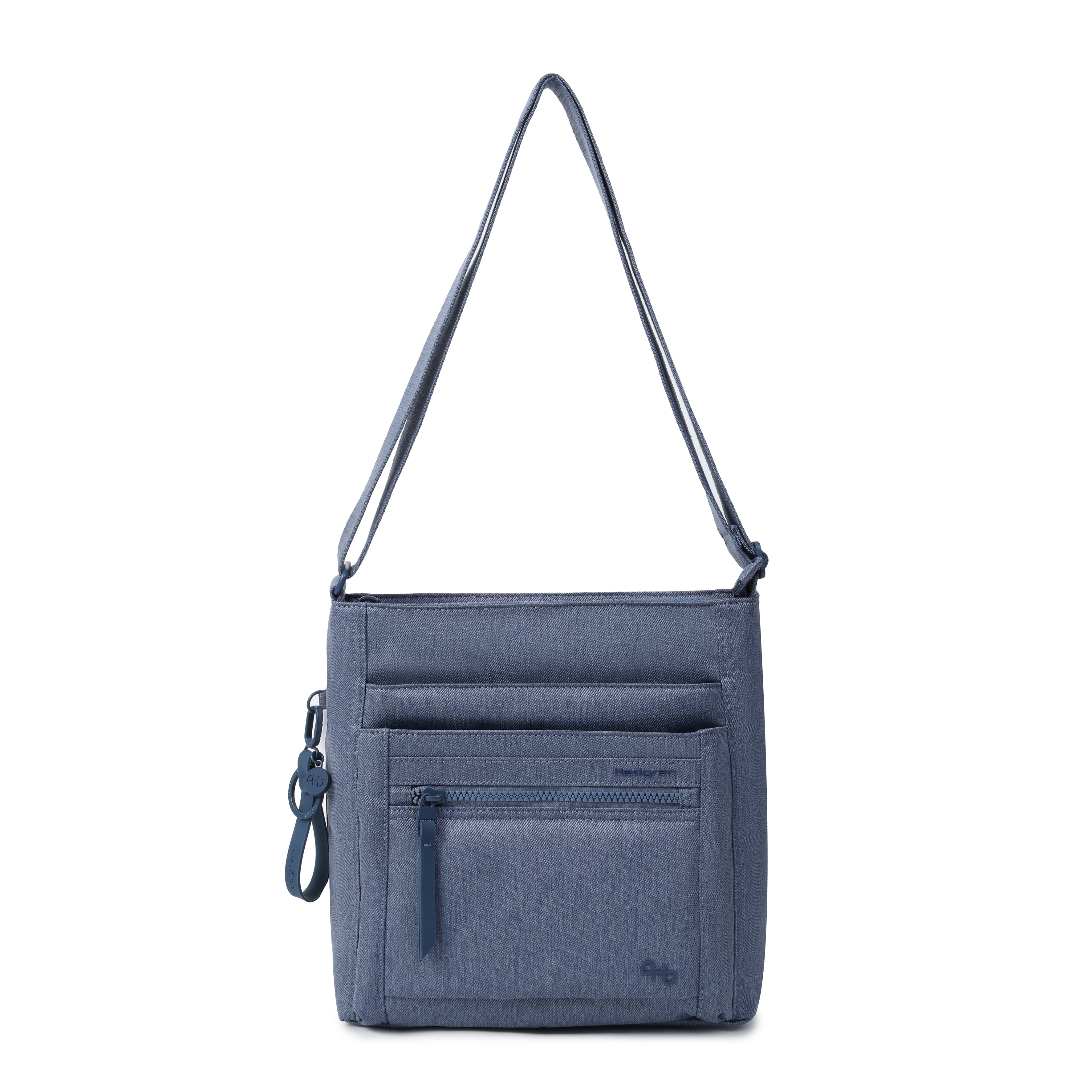 Orva RFID Crossbody with strap extended #color_vintage indigo jean