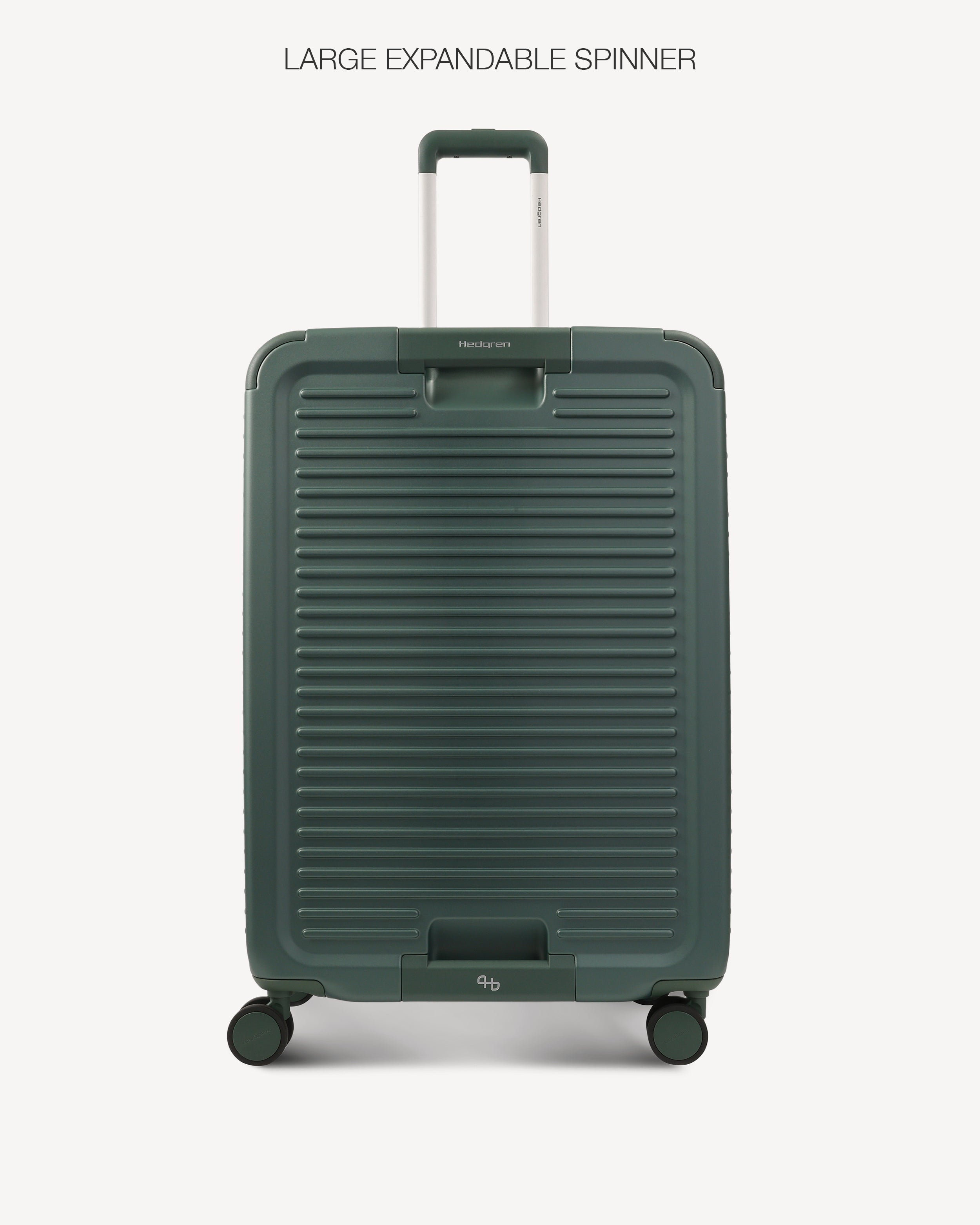 A dark green ribbed hard-shell spinner suitcase with an extended telescopic handle, shown from the front against a light gray background. The text 'LARGE EXPANDABLE SPINNER' is printed at the top.