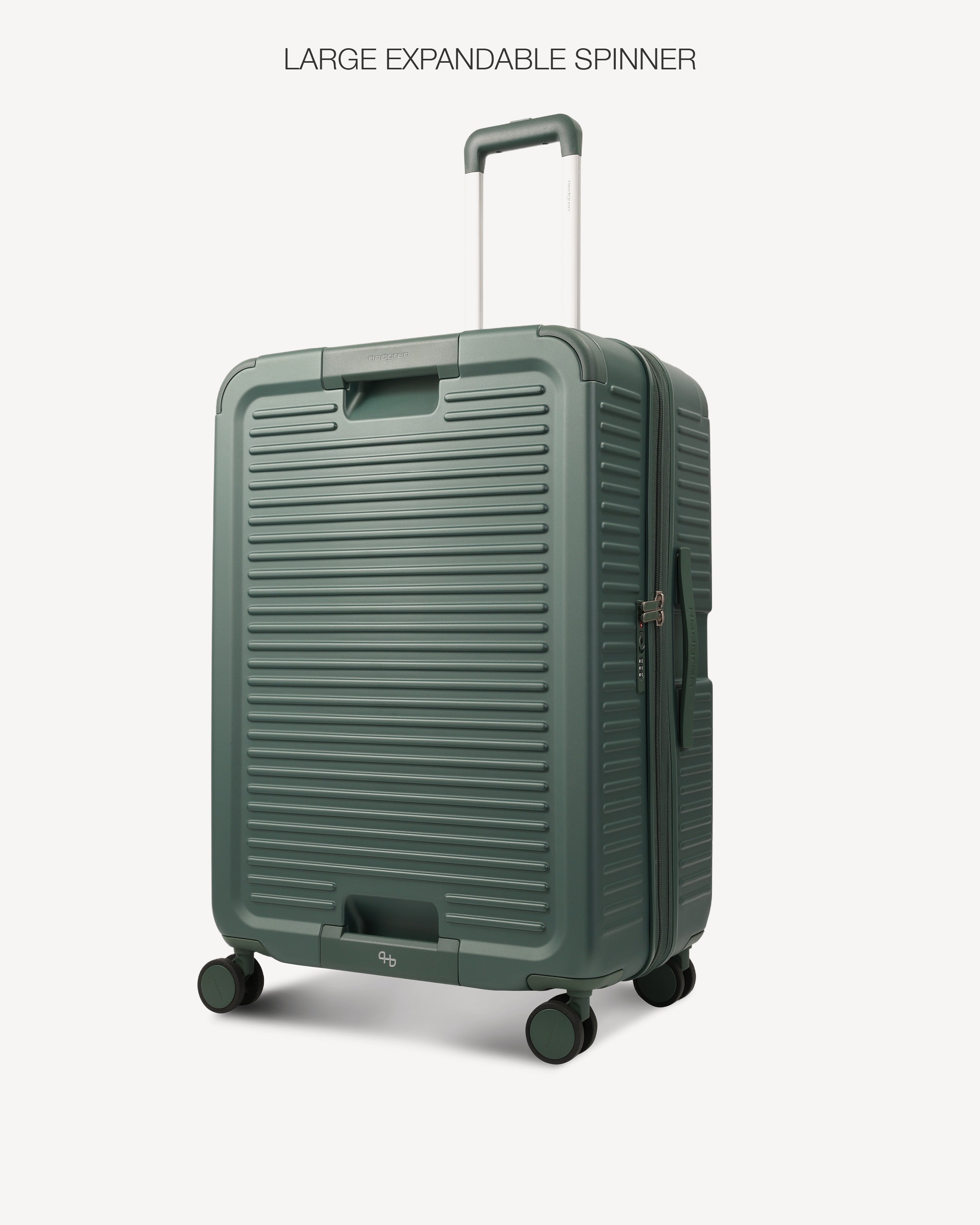 A dark green ribbed hard-shell spinner suitcase with an extended telescoping handle and four wheels, shown on a light gray background with the text 'LARGE EXPANDABLE SPINNER' at the top.