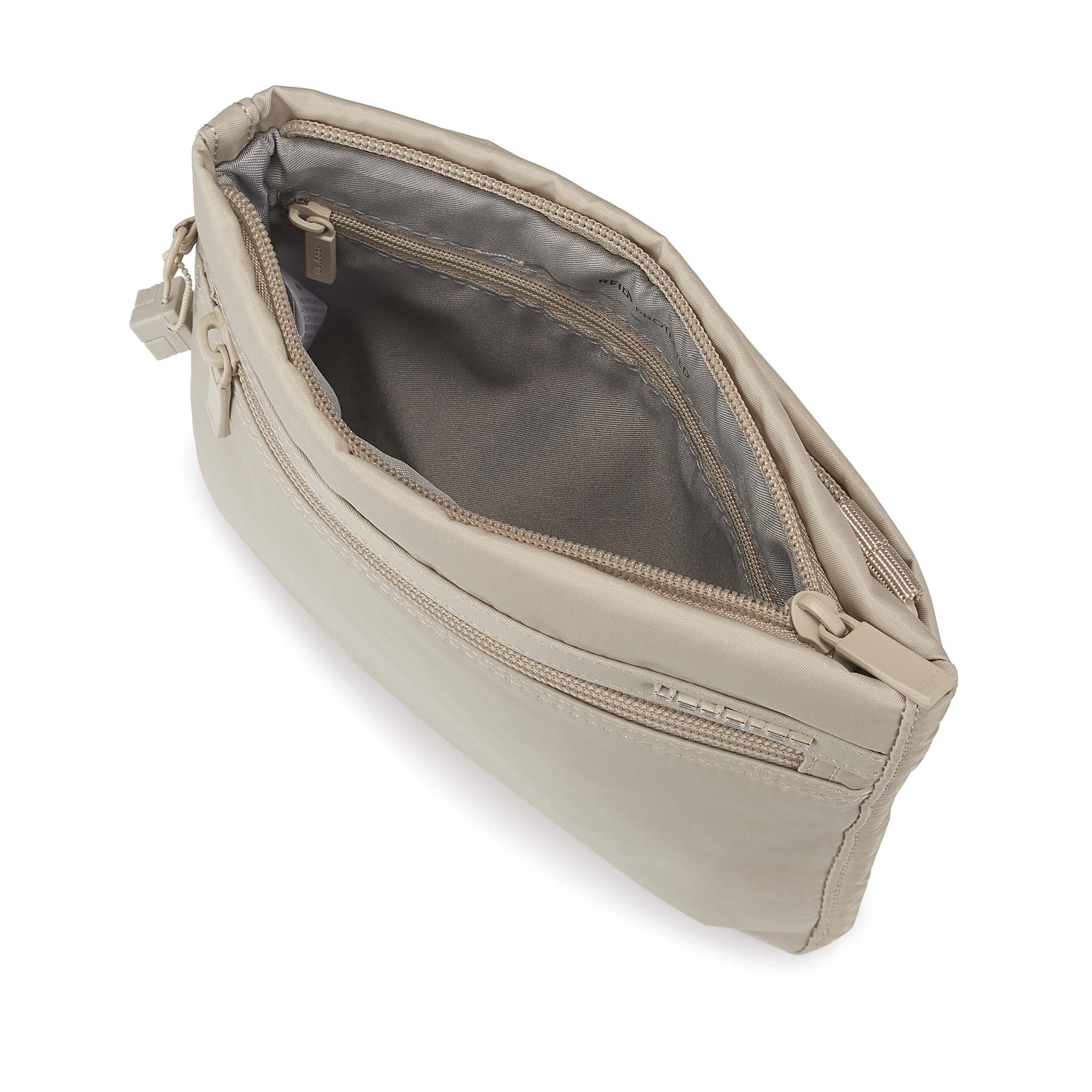 Interior of the Leonce RFID Crossbody in cashmere beige