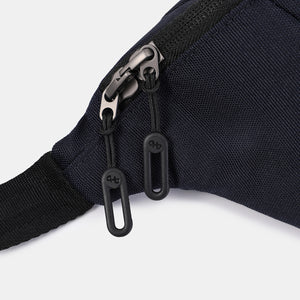 Close up of zipper on Hedgren's Visit Belt Bag in Peacoat Blue