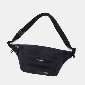 Hedgren's Visit Belt Bag in Peacoat Blue with straps extended