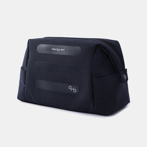 Front angled view of Hedgren Break Toiletry Bag in peacoat blue