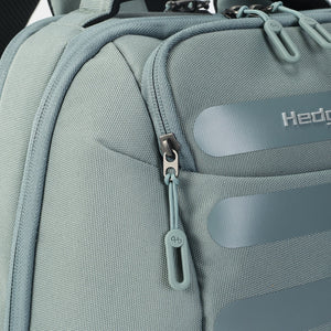 Close up of zipper on Hedgren's Handle Laptop Backpack in Grey Green