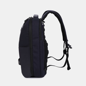 Side view of Hedgren's Handle Laptop Backpack in Peacoat Blue