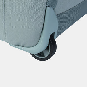 Close up of wheel on Hedgren Journey Rolling Duffle in Grey Green