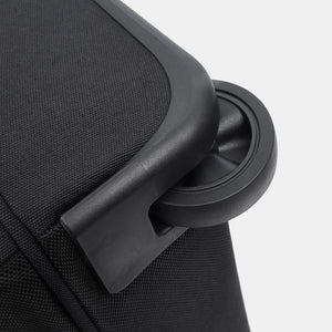 Close up of wheel on COMPACT Rolling Duffle in Black