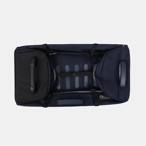 Hedgren's COMPACT rolling duffle in peacoat blue sides folded down for storage