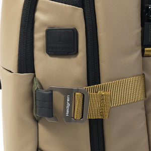 Compression strap on Hedgren's RAIL Backpack in Vintage Beige