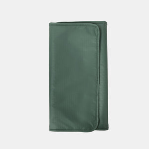 Changing pad in Hedgren's TSUTSUMI Diaper Backpack in Duck Green