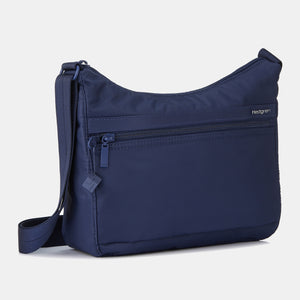 Front and side of the Harpers Shoulder Bag in Total Eclipse Navy