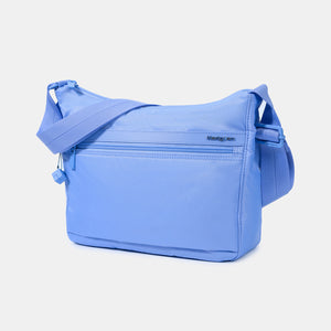 Side angle view of the Harpers Shoulder Bag in Jacaranda Blue