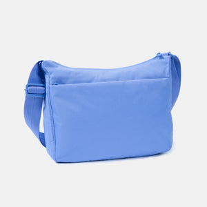 Back side of the Harpers Shoulder Bag in Jacaranda Blue