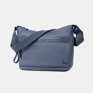 Front and side of the Harpers Shoulder Bag in Vintage Indigo (jean like fabric)