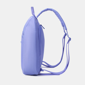 Side view of the Vogue small backpack in Jacaranda Blue