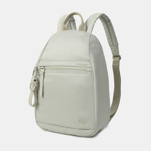 Front angled view of Vogue small backpack in Willow Grey made with a jean like fabric