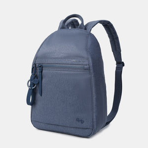 Front angled view of the Vogue small backpack in Vintage Indigo (jean like material)