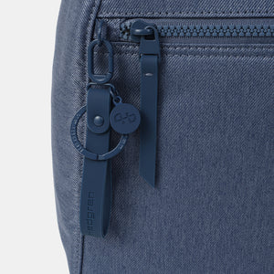 Close up of zipper on the Vogue small backpack in Vintage Indigo