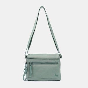 Eye RFID shoulder bag in lily pad green with strap extended