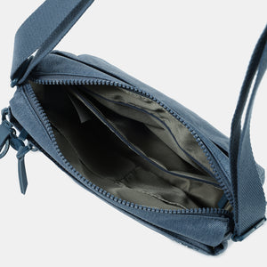 Interior of the Eye RFID shoulder bag in vintage indigo