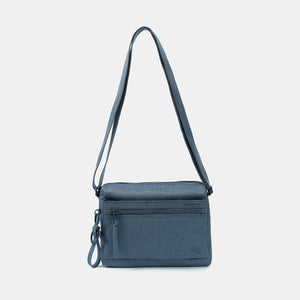 Eye RFID shoulder bag in vintage indigo with strap extended