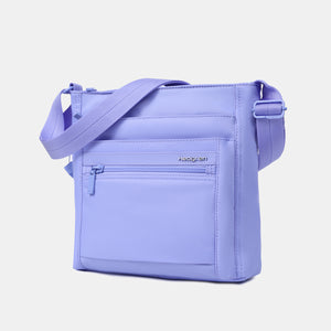 Front angled view of the Orva RFID Crossbody in Jacaranda Blue