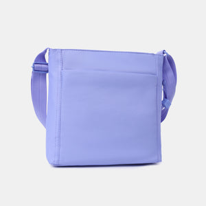 Back of the Orva RFID Crossbody in Jacaranda Blue