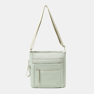 Orva RFID Crossbody in willow grey with strap extended