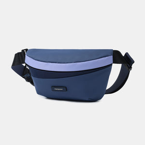 Front angled view of Hedgren's Halo Belt Bag in Blue Mix