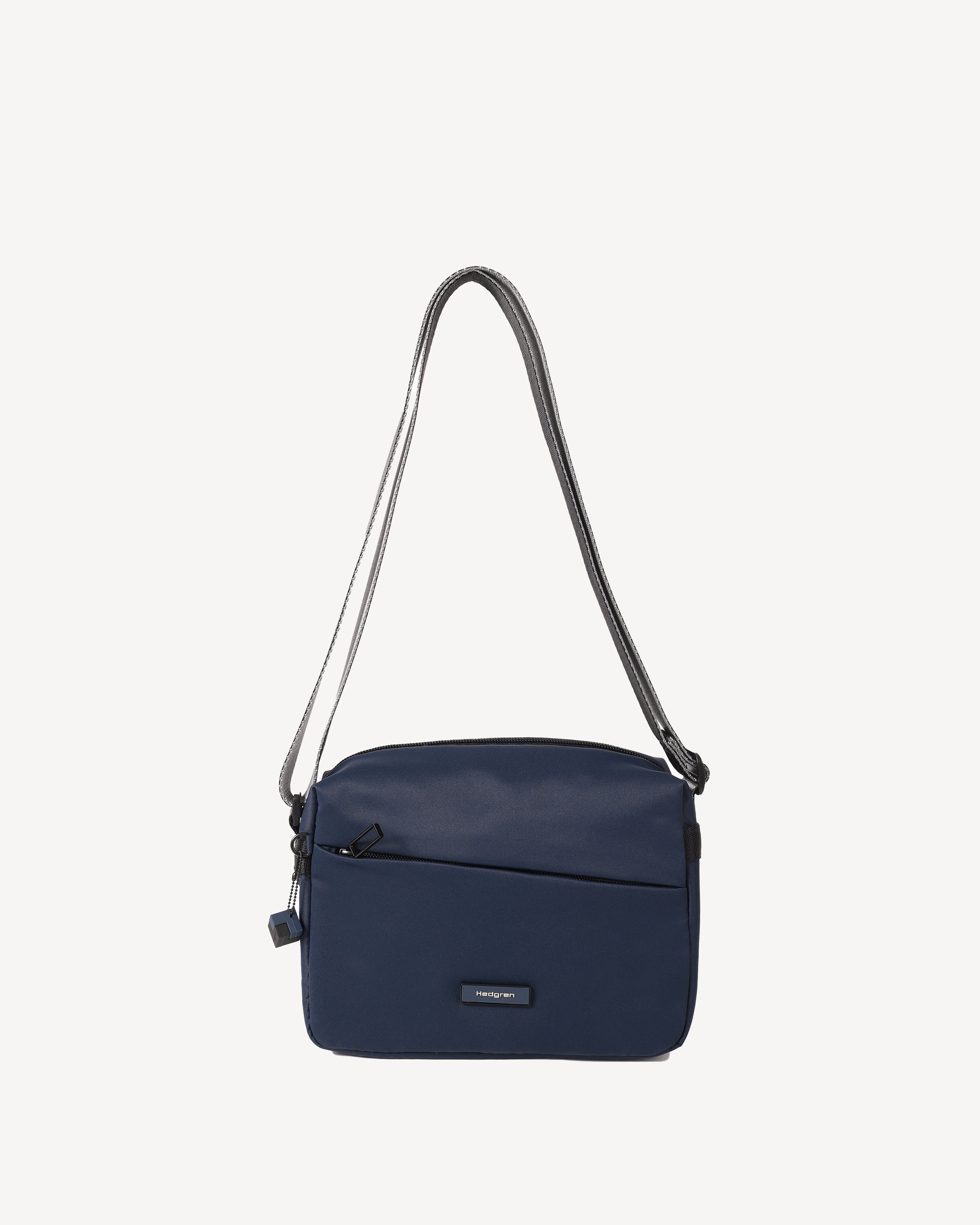 NEUTRON Lightweight Crossbody in Navy Cosmos | Hedgren