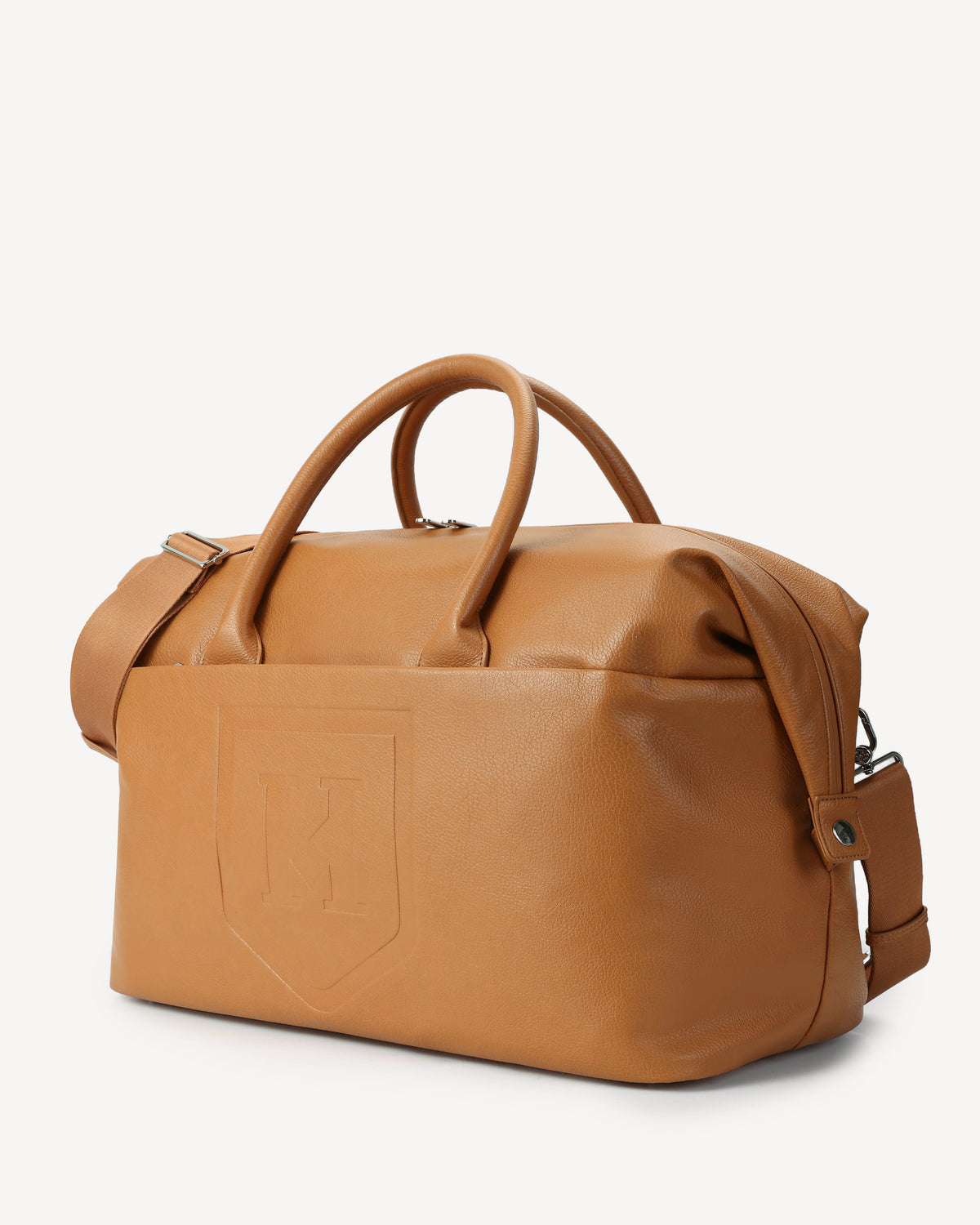Front angled view of the Honorable Mention Weekender in Tuscany Vegan Leather on a light grey background. 