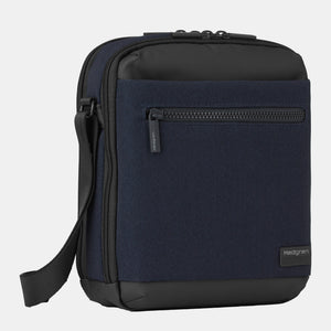 Front angled view of Hedgren's INC Crossbody in Elegant Blue