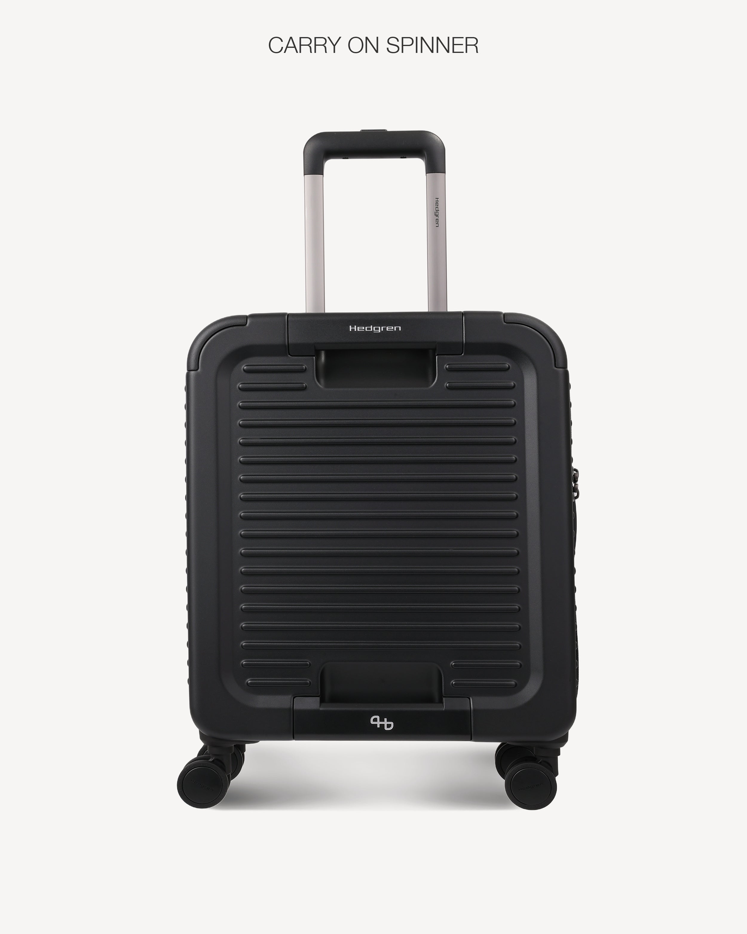 A black Hennessey's carry-on spinner suitcase with a telescoping handle extended, shown from the front against a light gray background with the text 'CARRY ON SPINNER' above it.