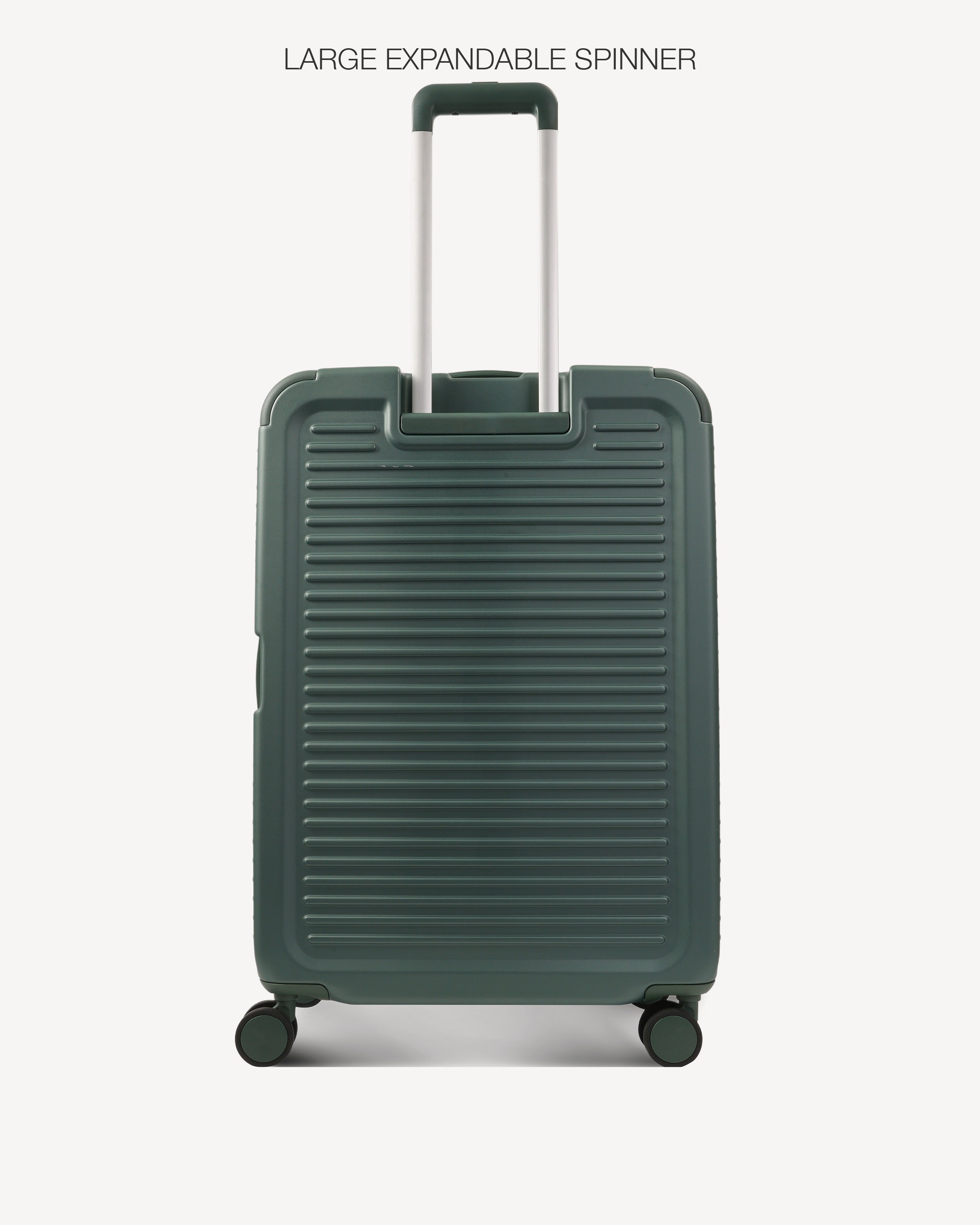 A dark green hardshell spinner suitcase with a ribbed front design, shown with its telescoping handle extended against a light gray background. Text at the top reads 'LARGE EXPANDABLE SPINNER'.