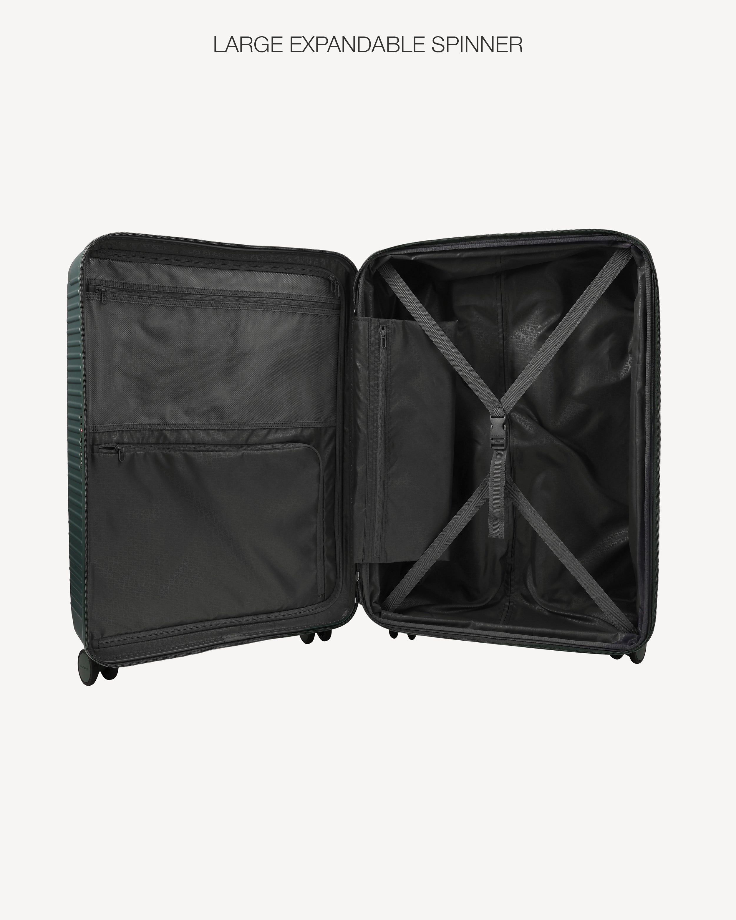 An open black hard-shell spinner suitcase shown from the inside, displaying the spacious interior, zippered compartments, and X-straps, with the text 'LARGE EXPANDABLE SPINNER' above it on a light gray background.