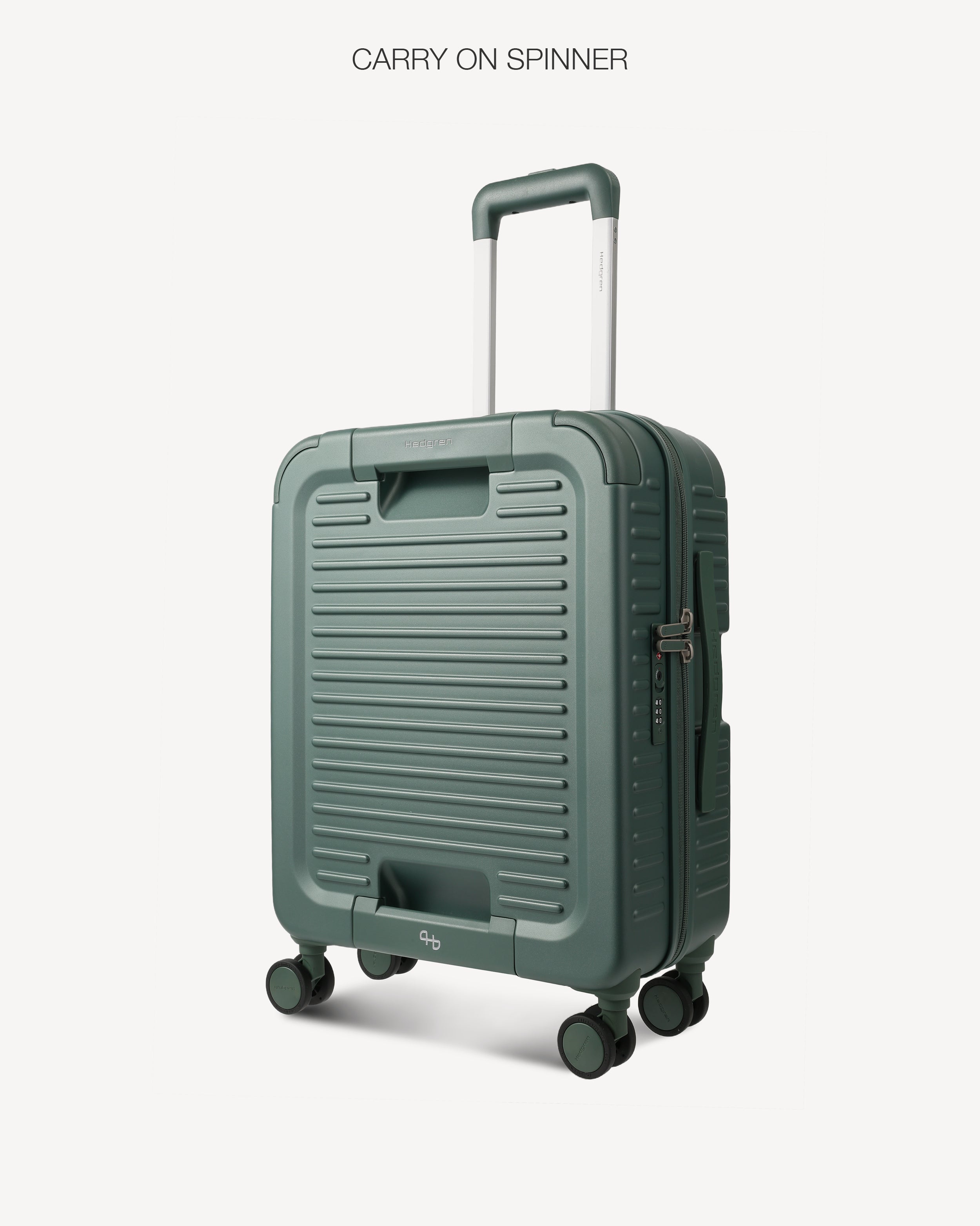 A dark green ribbed hard-shell spinner suitcase with an extended telescopic handle, shown on a light gray background with the text 'CARRY ON SPINNER' at the top.