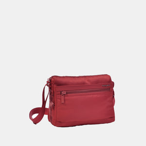 Front angled view of Eye RFID shoulder bag in sun dried tomato red